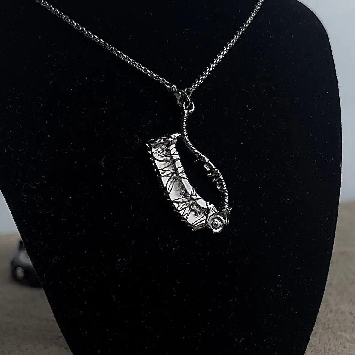 SAW CLEAVER PENDANT