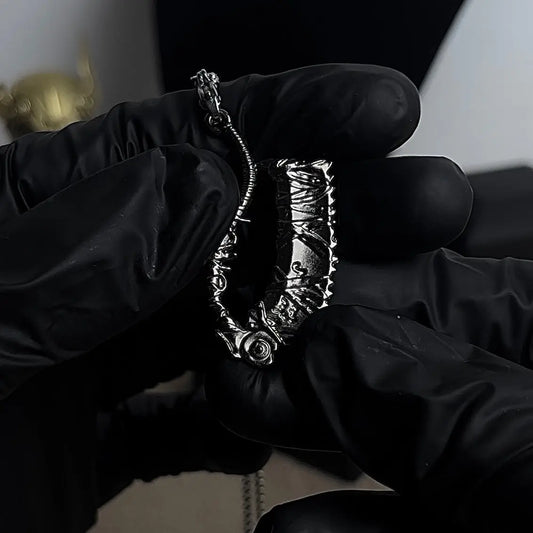 SAW CLEAVER PENDANT